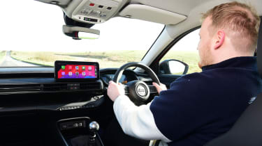 Auto Express news reporter Ellis Hyde driving the Jeep Avenger Altitude+